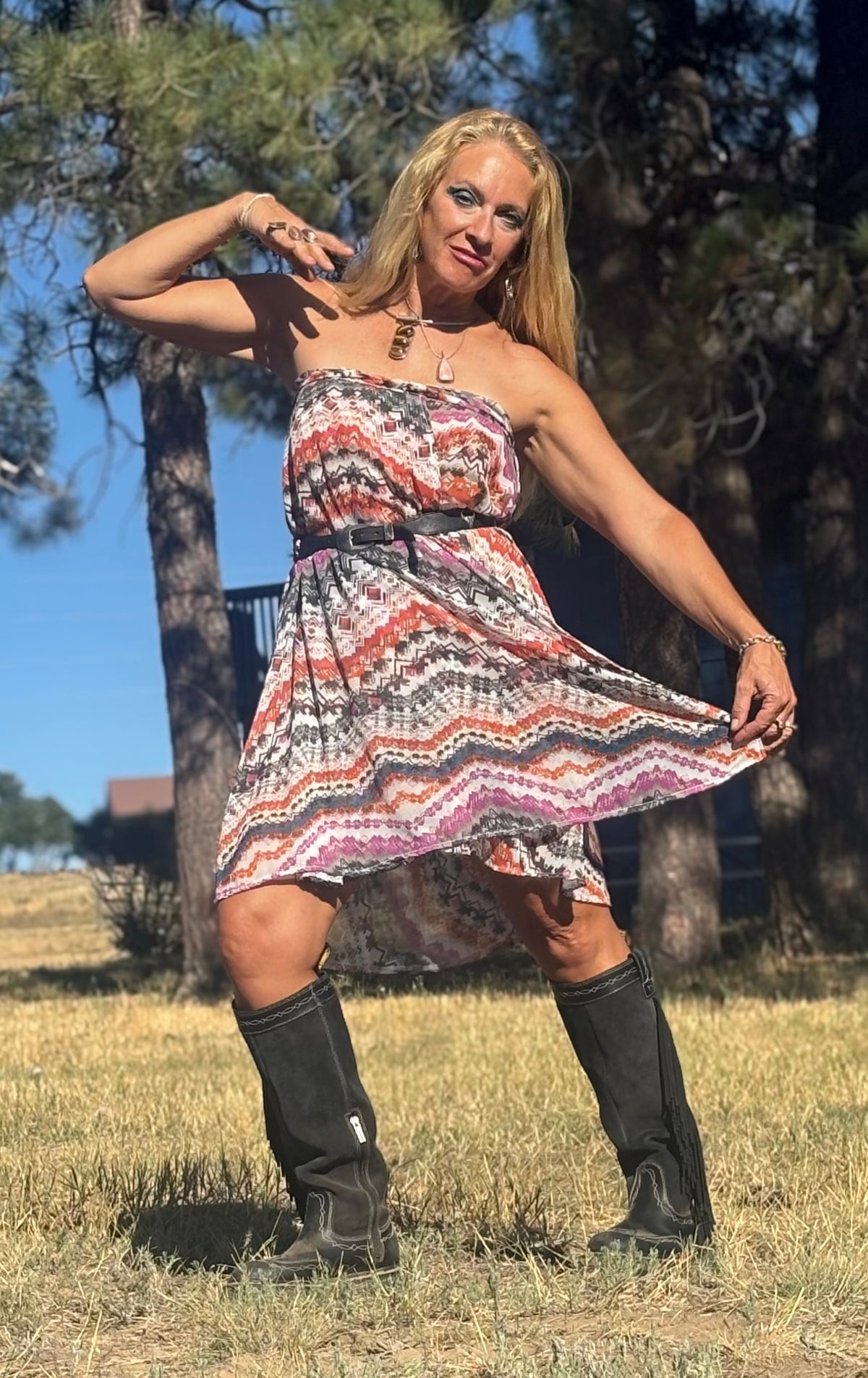 Load video: Ojo Fashions Designer Stephanie Jones working in studio.